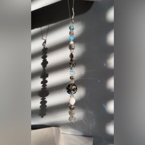 Car/window decor with crystals. Sun-catcher that makes a rainbow on the sun
